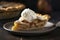 A classic apple pie served on a ceramic plate. 